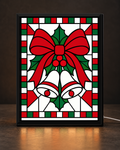 Illustrative CNS Customs Christmas Bow + Holly Bells framed light-up stained-glass-style design on dark countertop, exact owner-approved original art