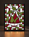Illustrative CNS Customs Harvest Pears + Acorns framed light-up stained-glass-style design on dark countertop, exact owner-approved original art