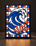 Illustrative CNS Customs Ocean Wave + Shells framed light-up stained-glass-style design on dark countertop, exact owner-approved original art