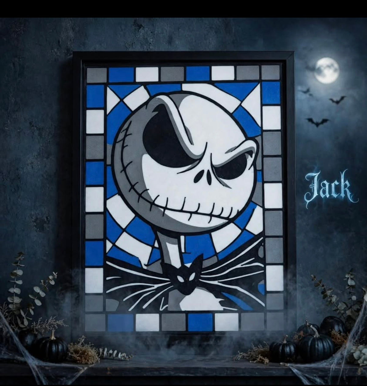 Jack Skellington portrait with blue, gray and white mosaic border displayed in a black light-up frame