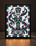Illustrative framed preview of green purple nutcracker figure standing on an ornate music box in black light-up frame