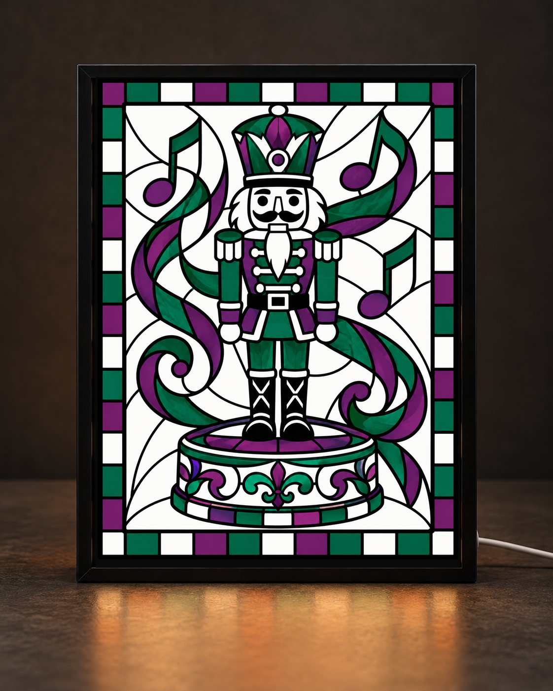 Illustrative framed preview of green purple nutcracker figure standing on an ornate music box in black light-up frame