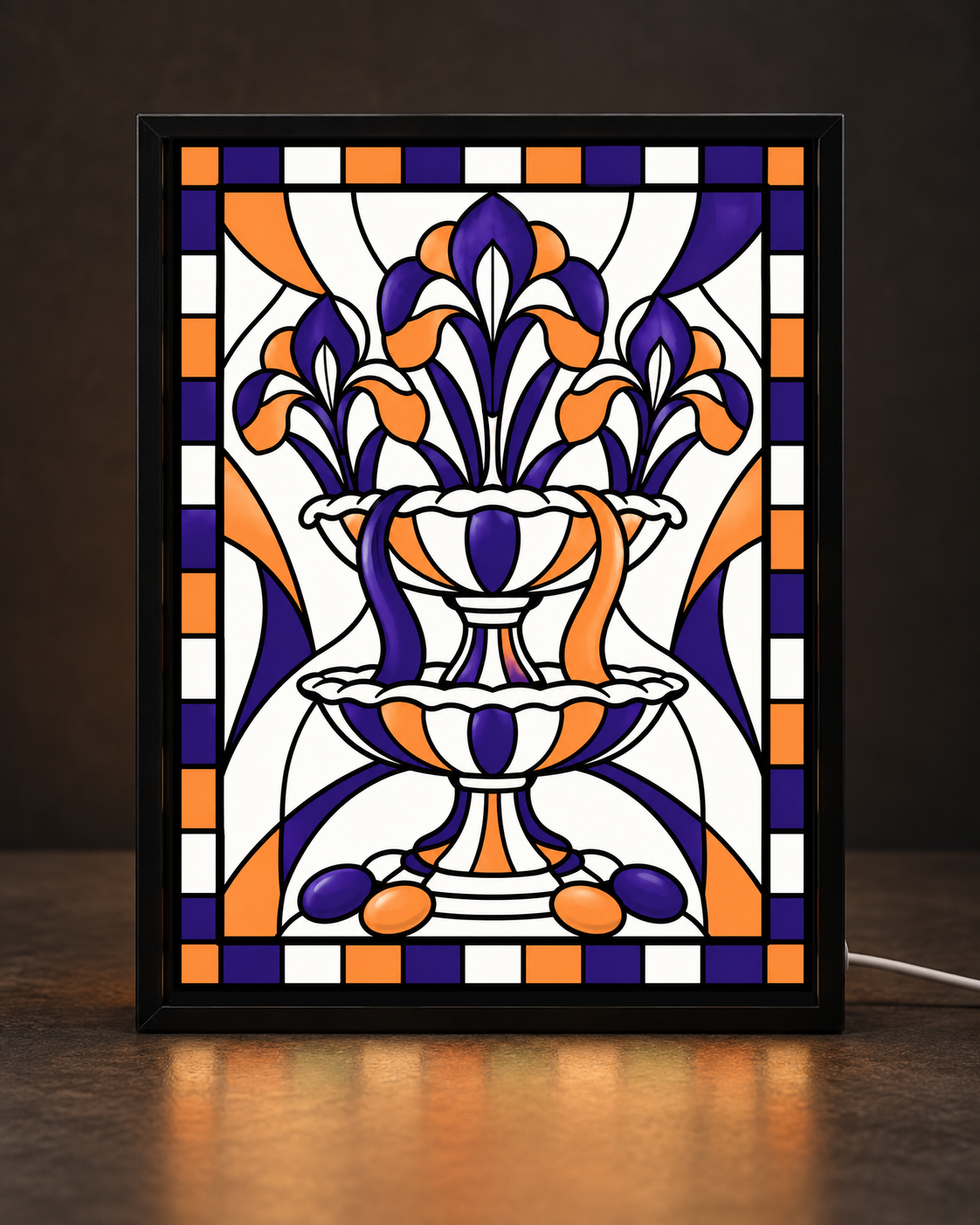 Illustrative framed preview of two-tier ornamental fountain with purple and orange iris blossoms in matte black light-up frame