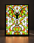Illustrative framed preview of black bat with spread wings over glowing lime-green and orange potion vessel and stained glass frame