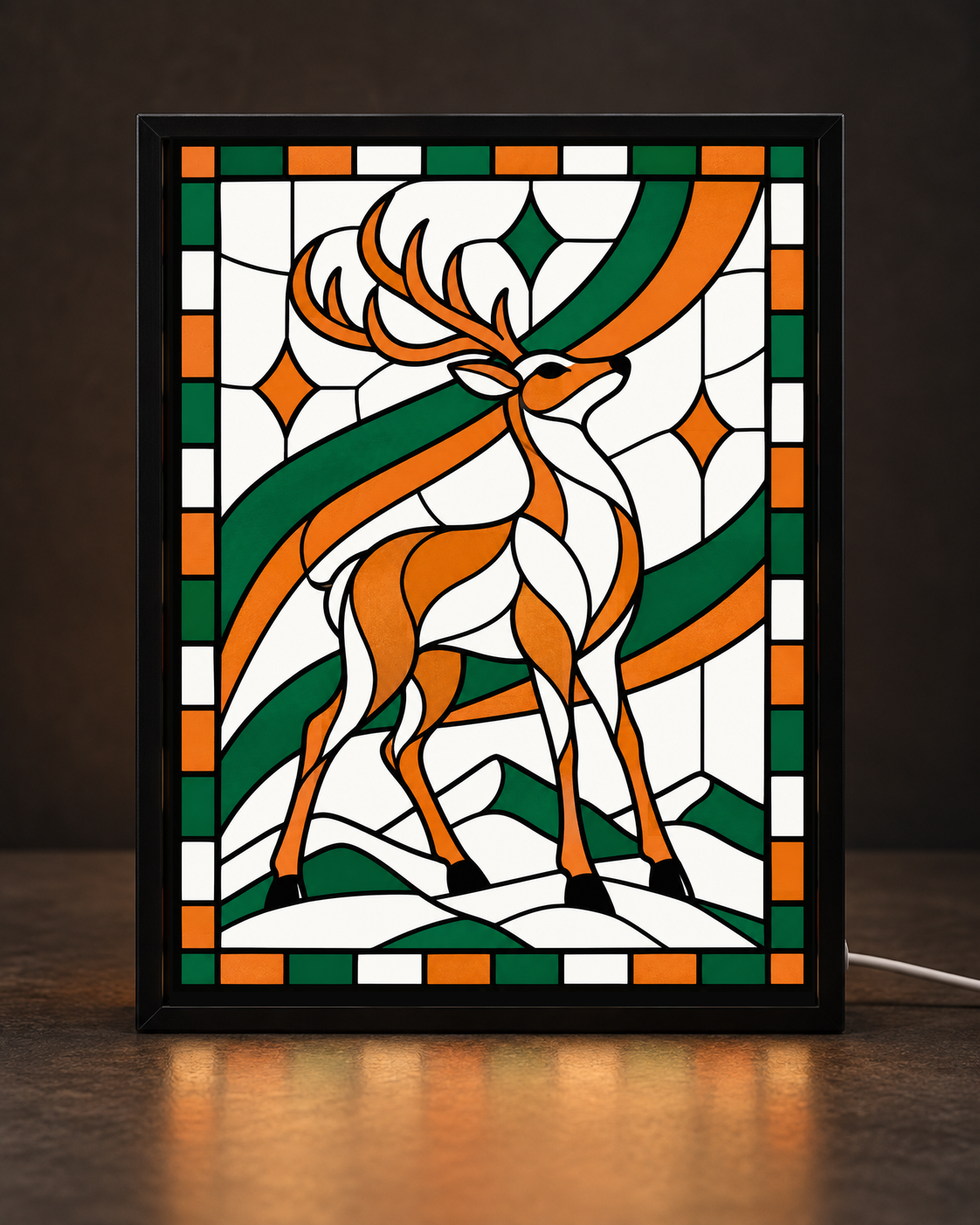 Illustrative digital preview of orange-and-white winter reindeer surrounded by sweeping green and copper ribbons in a slim black tabletop light-up frame